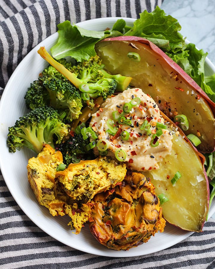 tofu "egg" muffin cups with sweet potato, broccoli, and hummus