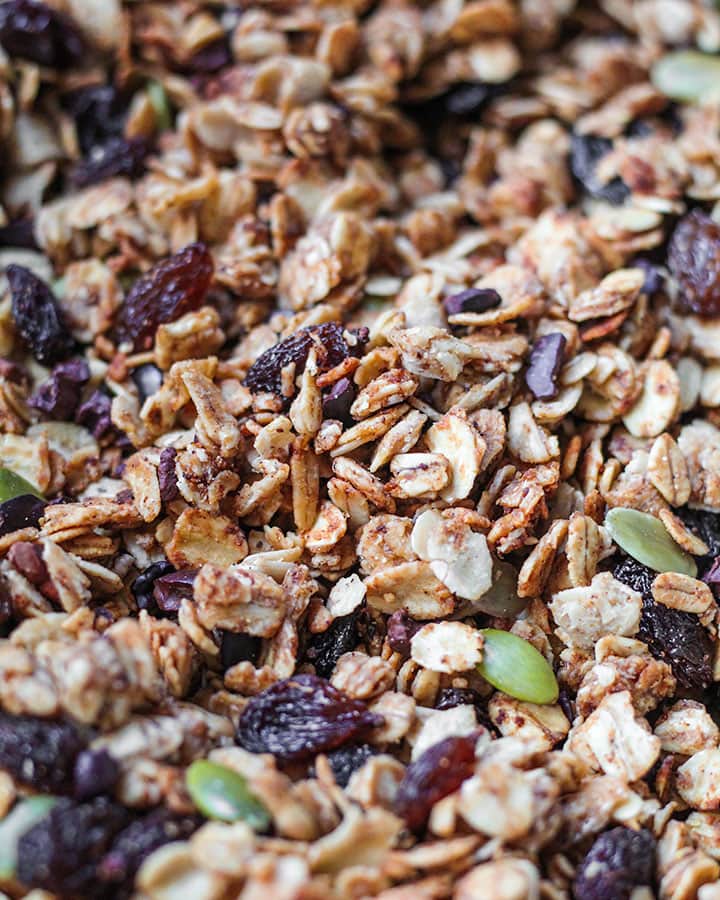 Fresh batch to granola spread out to cool before storing.