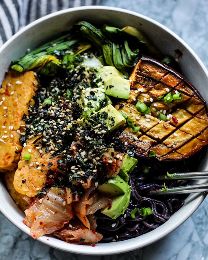 Spicy miso eggplant bowl with more toppings of nori seasoning and kimchi.