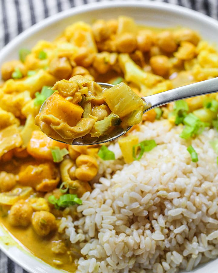 Bite shot of the mango coconut chickpea curry.