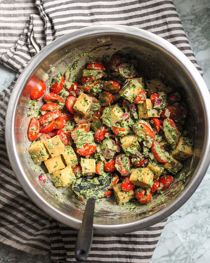 Mixing bowl with pesto tofu.