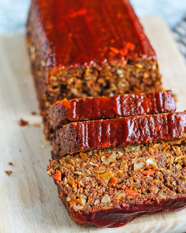 Front view of the lentil loaf sliced into individual slices.