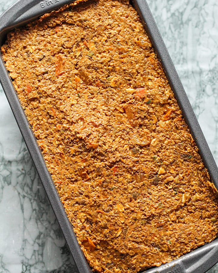 The resulting lentil loaf mixture combined together in a loaf pan.