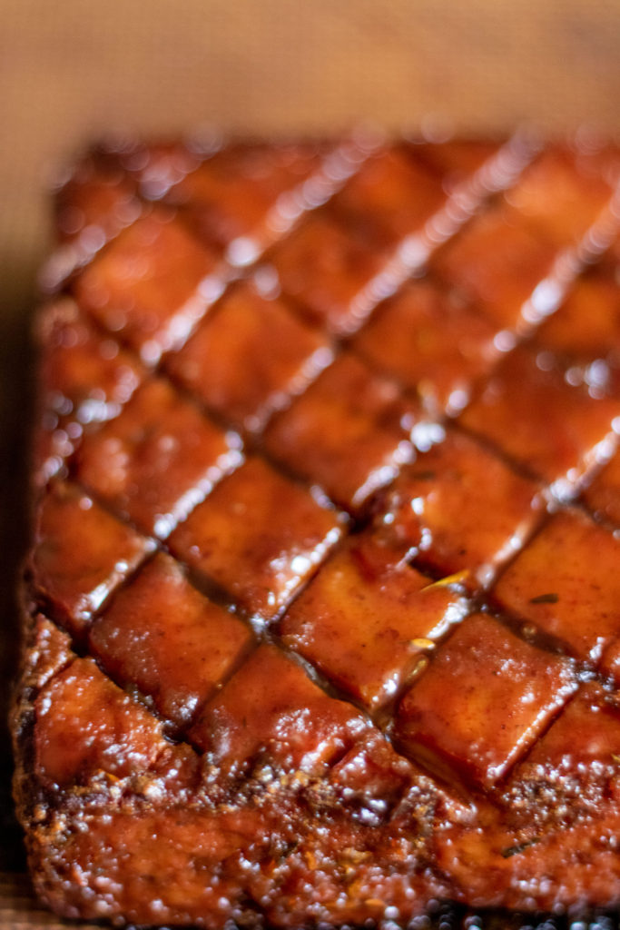 Tofu out of the oven, perfectly glazed after baking and resting.