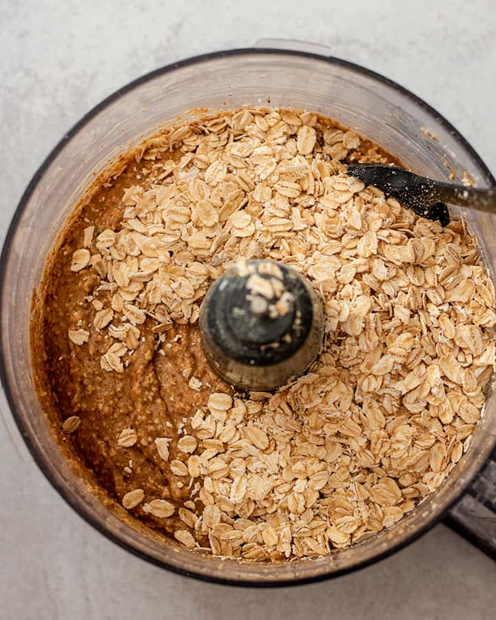 Food processor with last round of whole oats added to the batter.