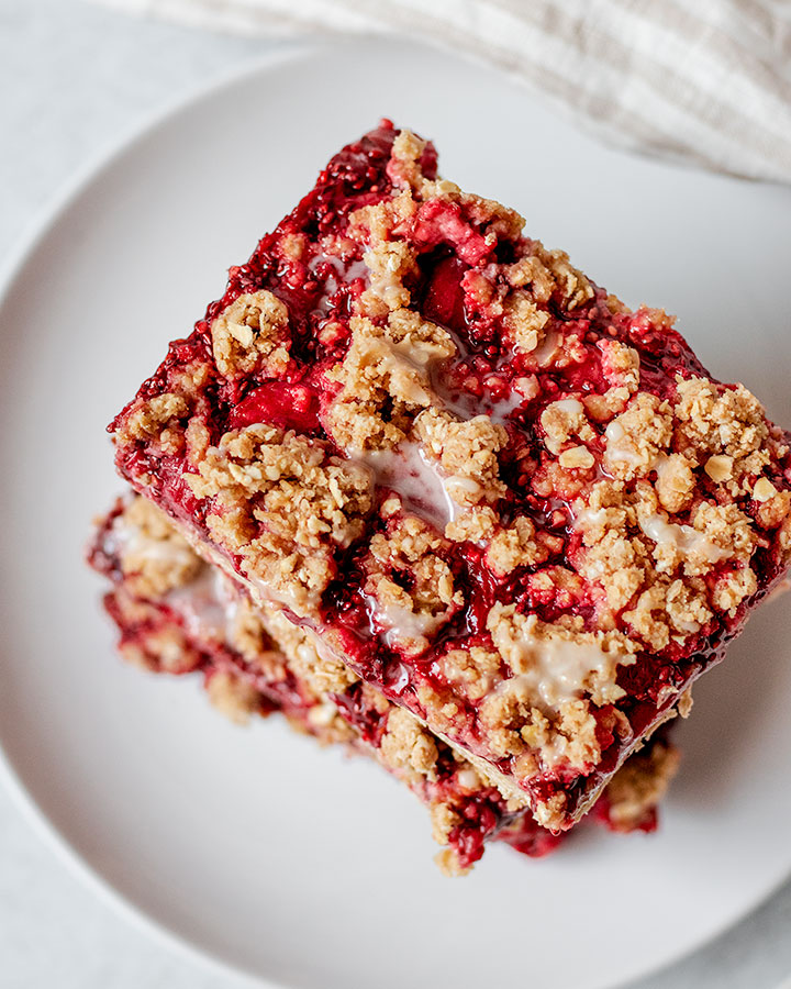 Top down view of the stacked bars and full view of the crumble topping.