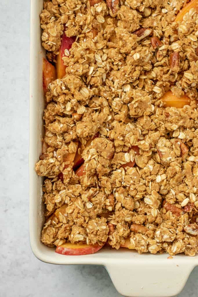 Peach filling covered with oat crumble.