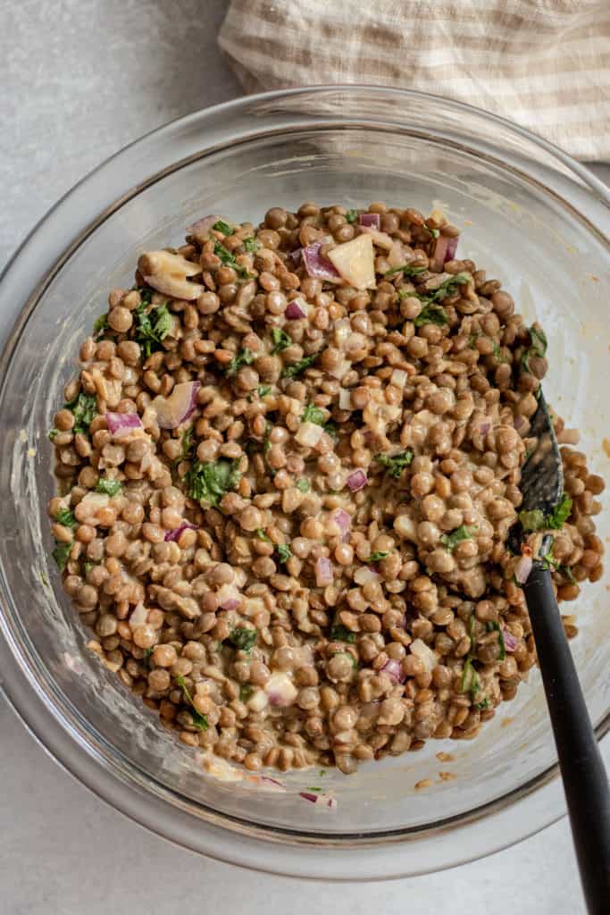 All of the lentils mixed with the dressing with cilantro folded into it.
