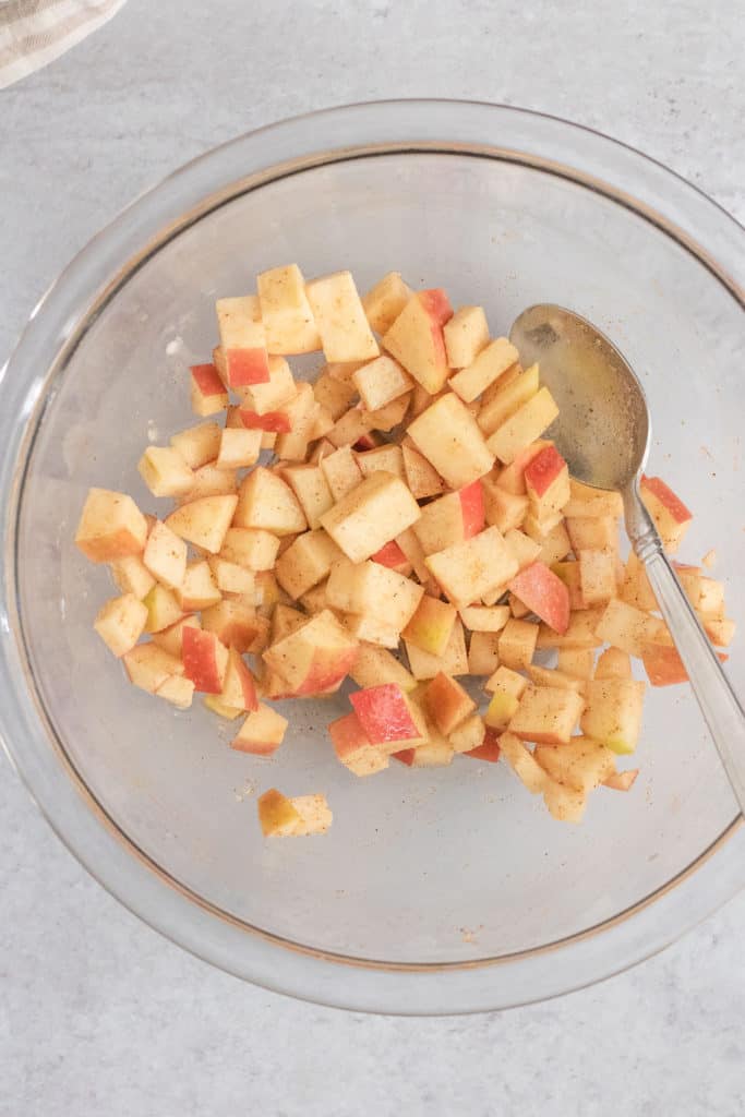 Diced apples in a bowl.