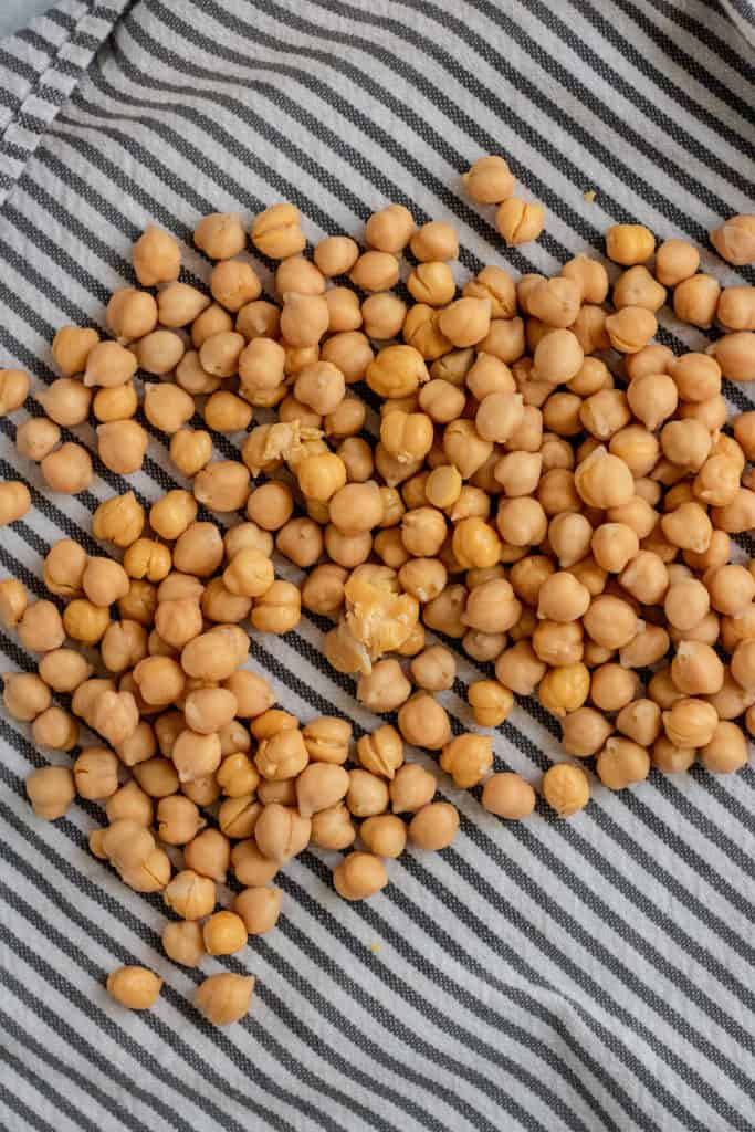 Chickpeas in a striped kitchen cloth.
