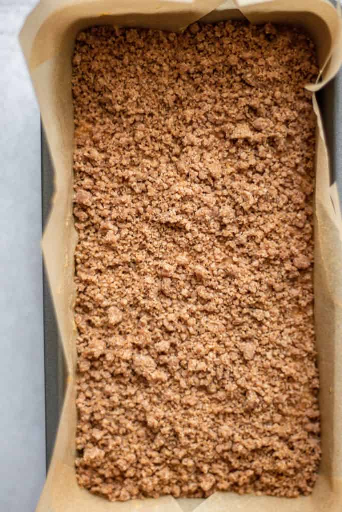 The pumpkin bread batter topped with the streusel topping.