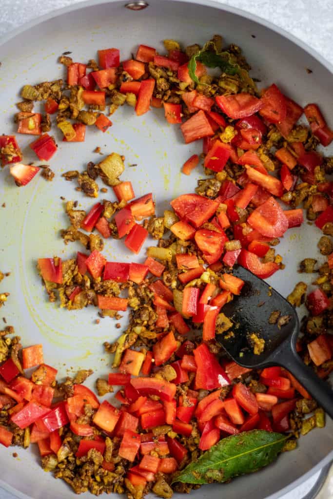 Dry spices mixed in along with the red bell pepper.