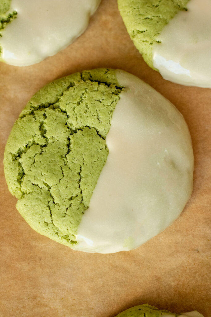 Close up view of a cookie with icing.