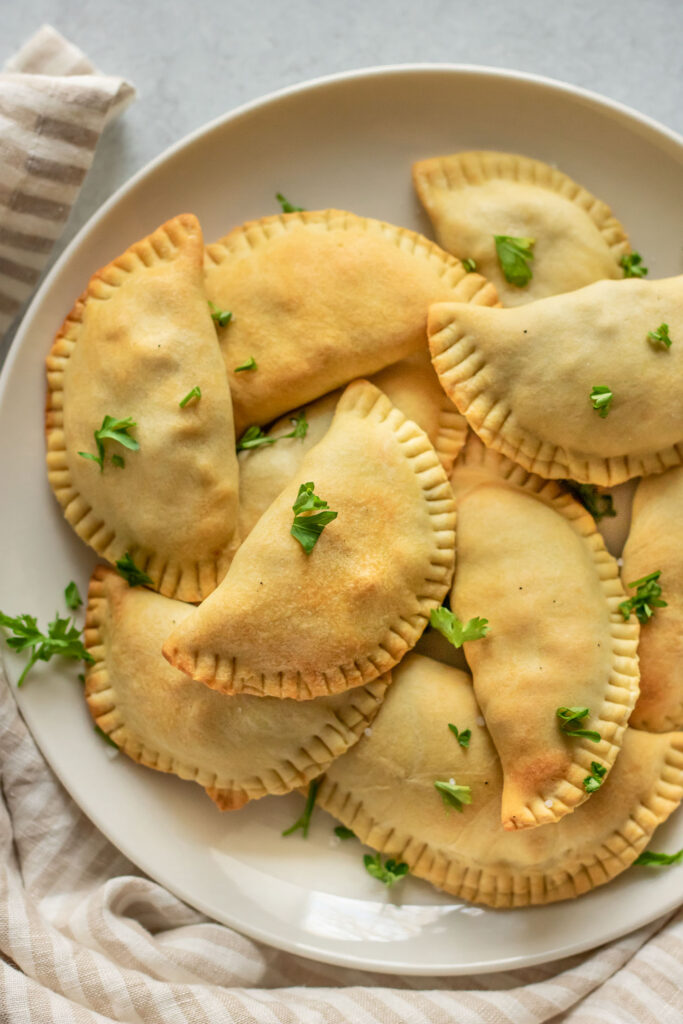 Pastelitos after being air fried, placed on a plate to serve.