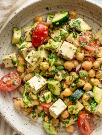 Chickpea salad after being tossed with tofu and plated.