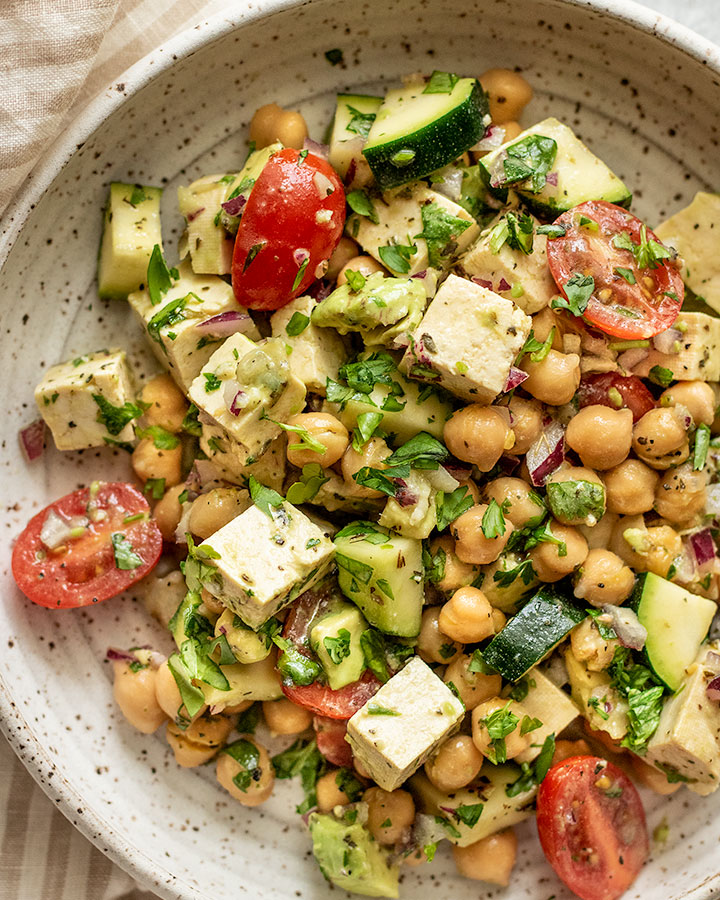 Chickpea salad after being tossed with tofu and plated.