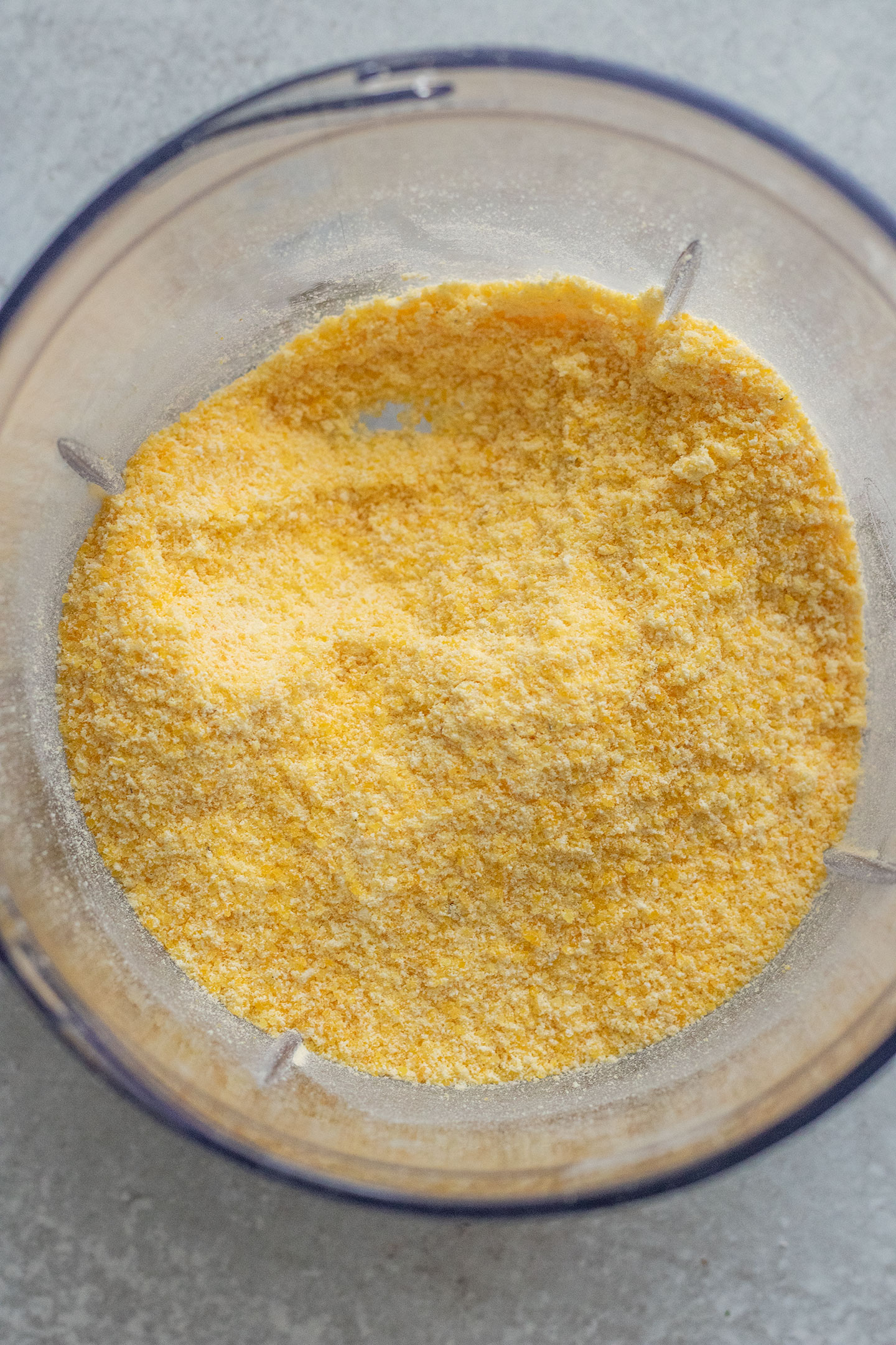 Blending polenta to make it less course in texture.