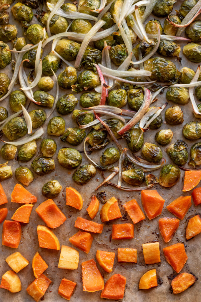 Fully roasted butternut squash, brussels sprouts and shallots.