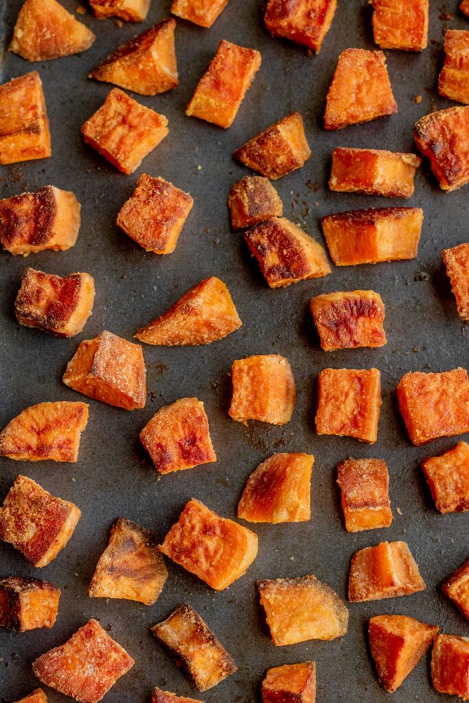 Roasted sweet potato after browning and cooking in the oven.