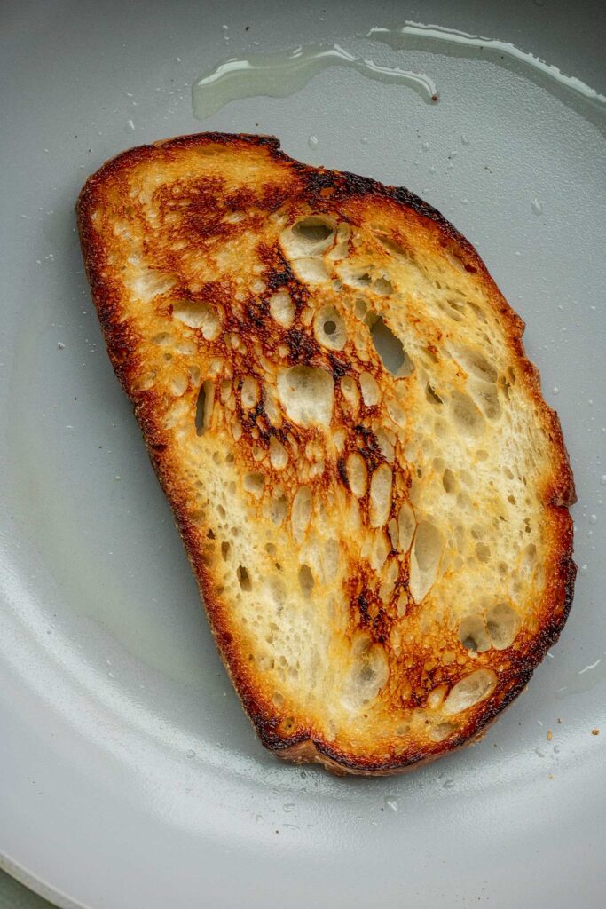 Toasting bread in a pan.