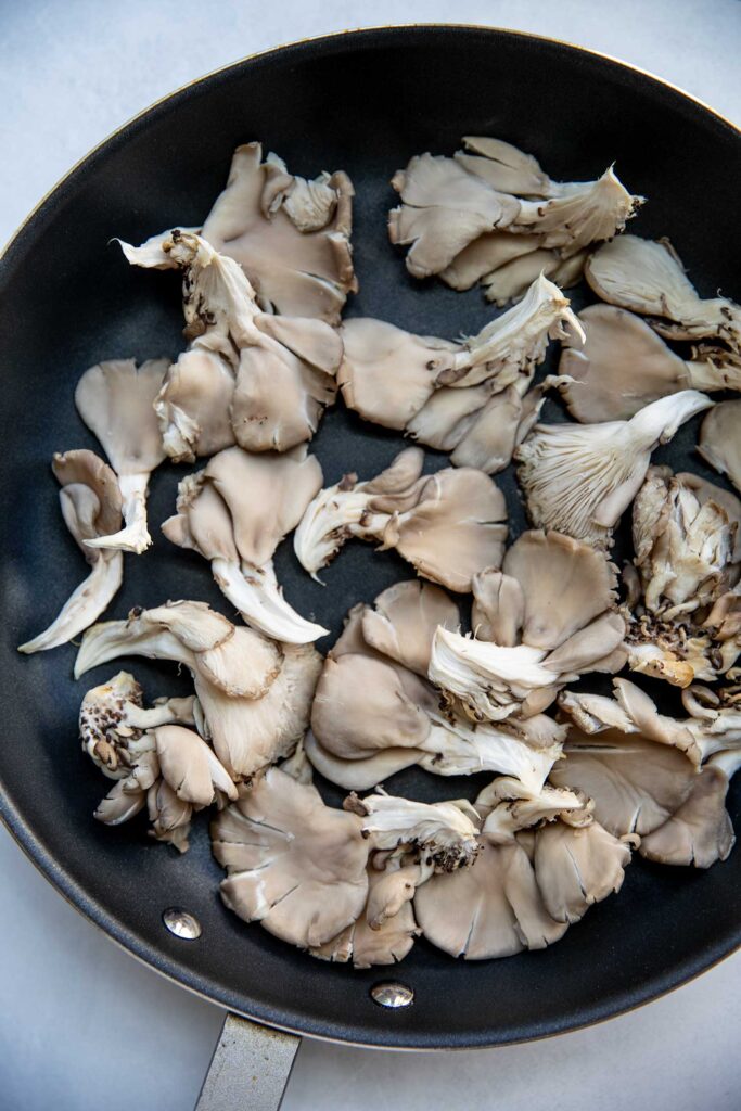 Oyster mushrooms in a pan.