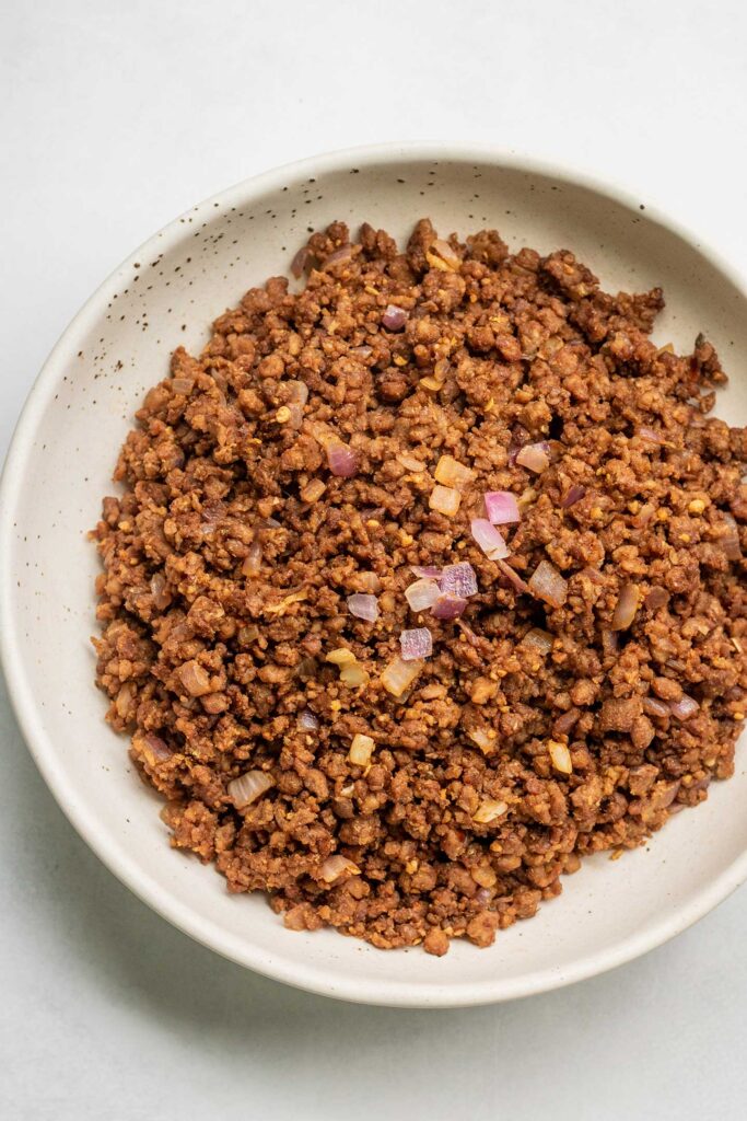 Taco seasoned ground crumbles in a bowl.