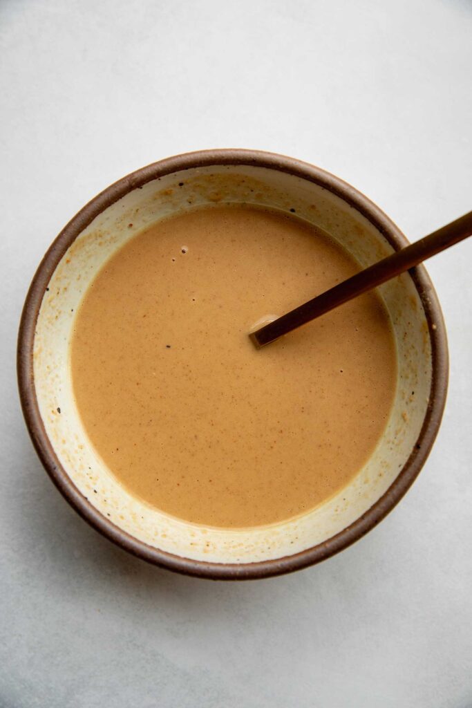 Peanut sauce mixed together in a bowl.