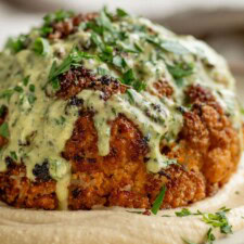 Whole Roasted Cauliflower with Creamy Scallion Date Dressing