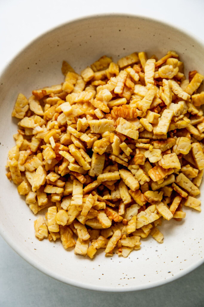 Golden crisp tempeh strips.