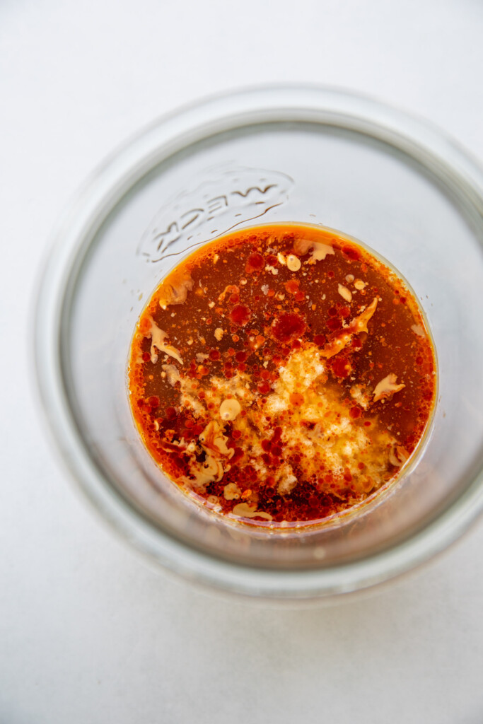 Sesame sauce ingredients in a blender cup.
