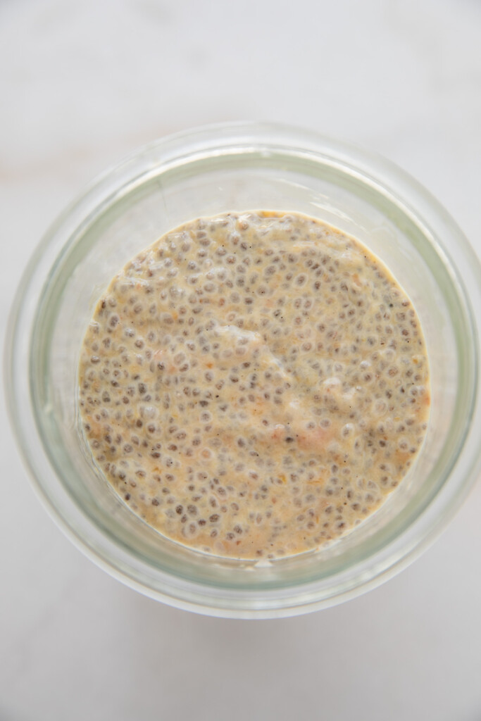 Thickened chia pudding in a container.