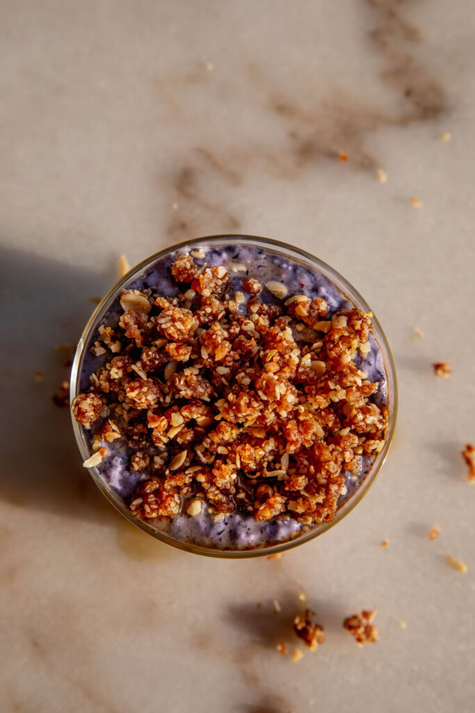 Top down view of the chia pudding topped with the toasted oat crumble.