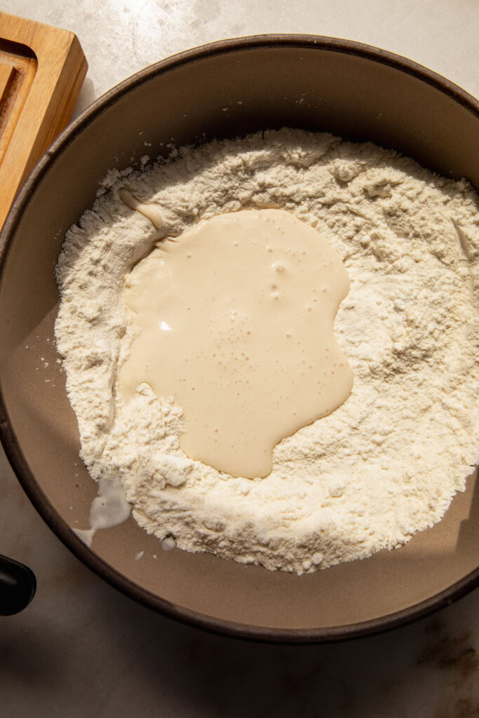 Flour being mixed with the blended silken tofu.