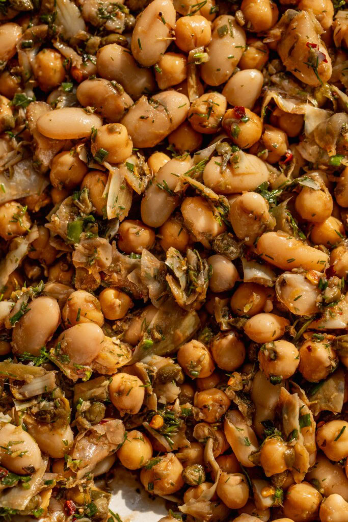 Close up of the marinated bean salad tossed in a balsamic and citrus dressing.