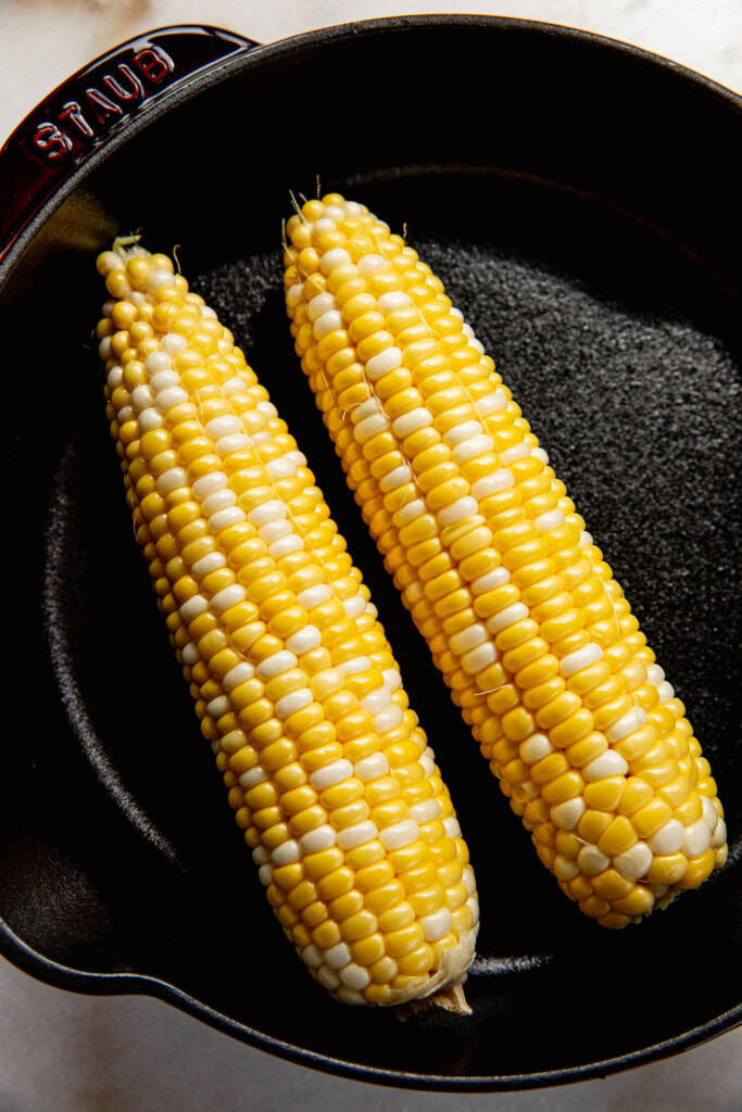 Corn cobs in a skillet.