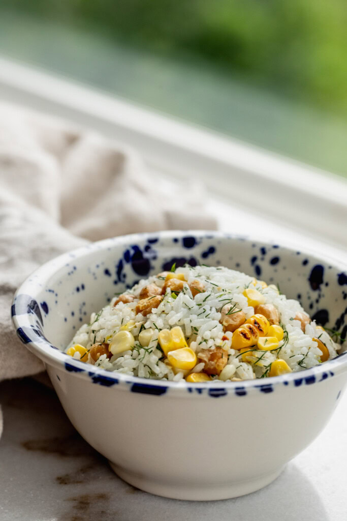 Serving bowl filled with mixed chickpea rice.
