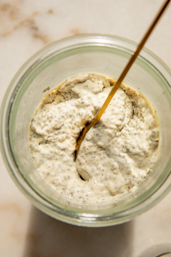 The thick chia pudding in a jar after it has fully set.