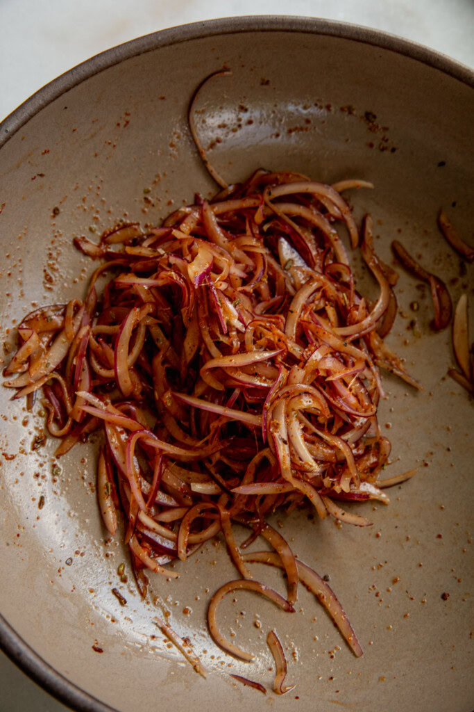 Marinated onions in a bowl.