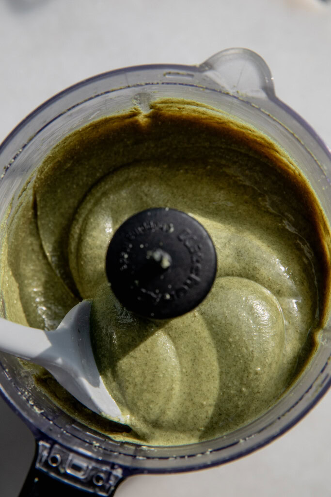 Pumpkin seed butter fully blended and creamy in food processor.