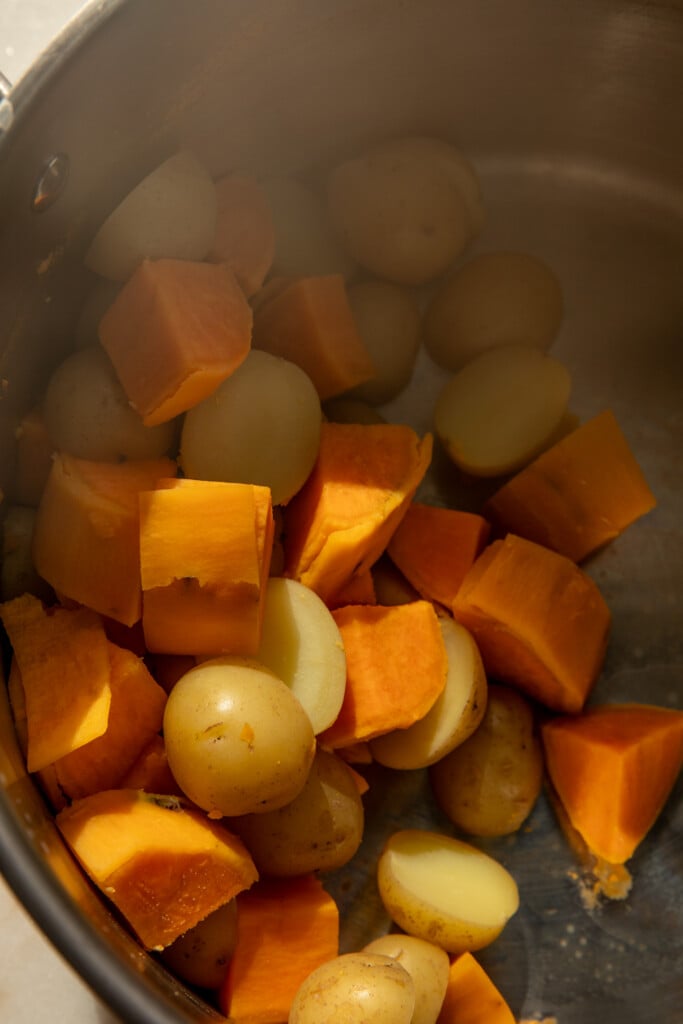 Cooked sweet potatoes and baby potatoes.