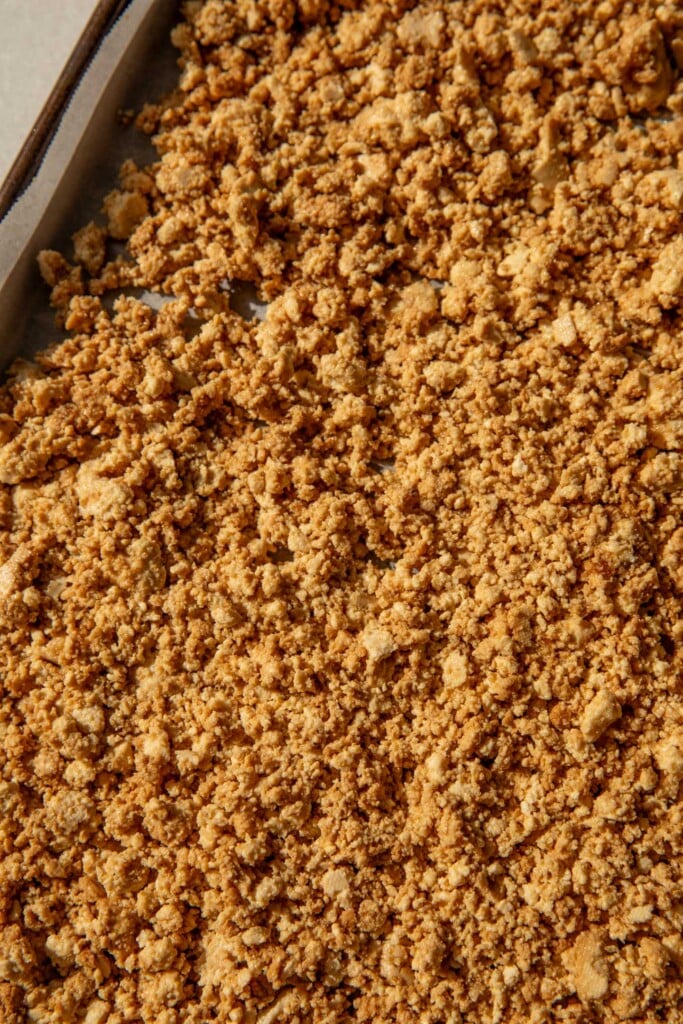 Seasoned crumbled tofu in a baking tray.